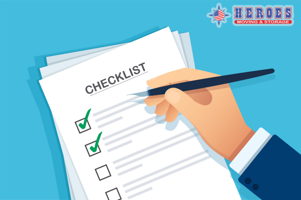 Hand checking off a business move checklist with boxes marked complete. Heroes Moving & Storage logo in the top right corner.